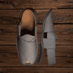 Side profile of the Danedar Peshawari Bera Chappal's open-toe build