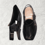 Hand-stitched precision on the Black Peshawari Chappal Lapa ankle strap