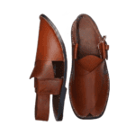 Wide flat silhouette of the Peshawari Gol Chappal from the side